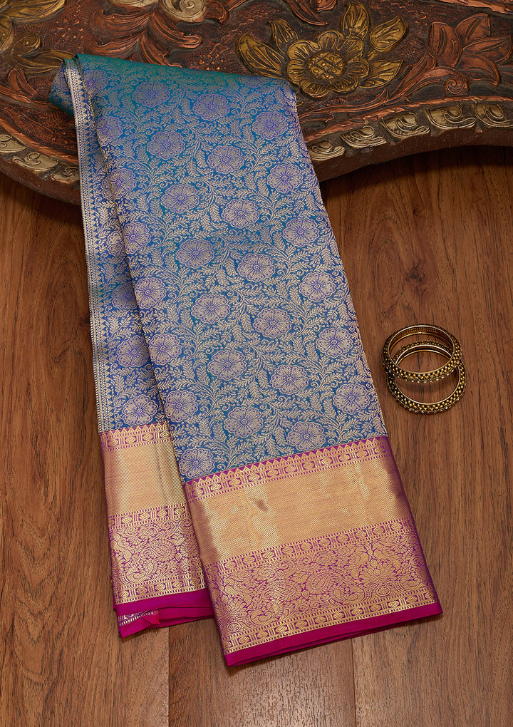 Peacock Blue Silk Jaal Saree With Matching Blouse Piece