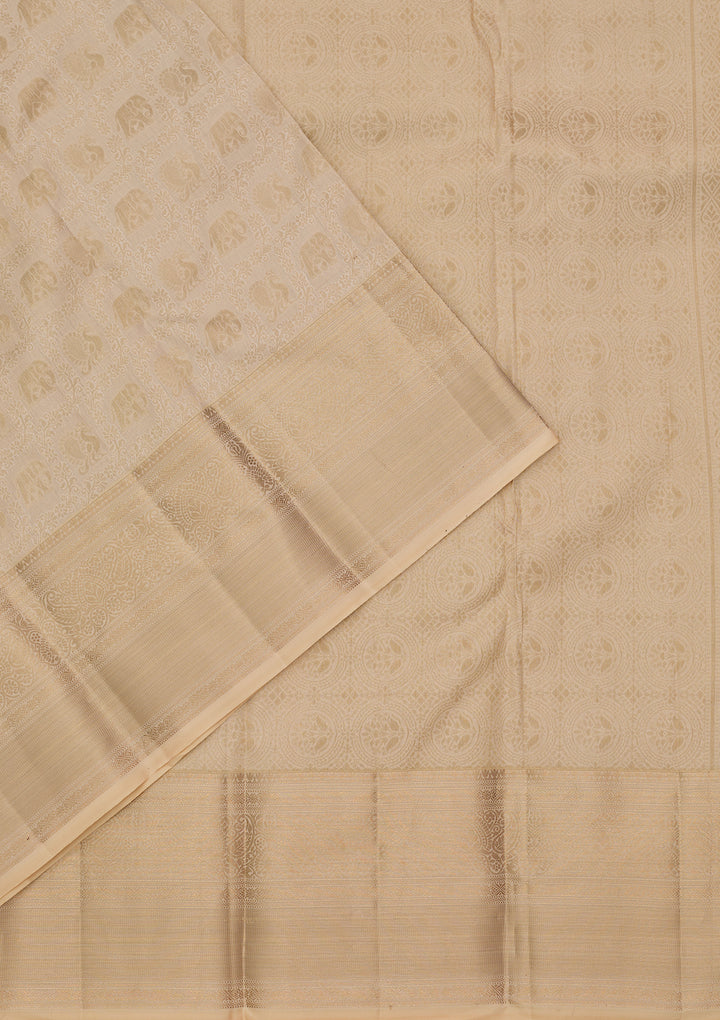 Cream Pure Silk Jaal Zariwork Saree With Matching Blouse Piece