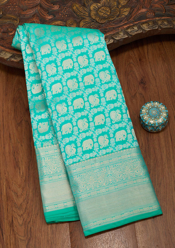 Turquoise Blue Silk Jaal Saree With Matching Blouse Piece