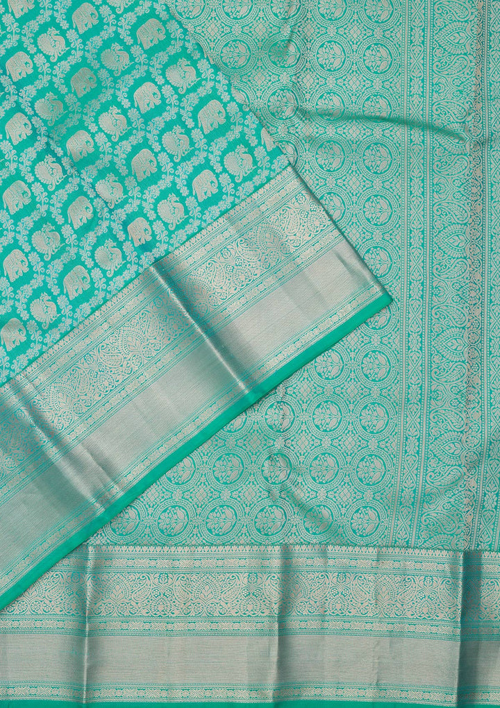 Turquoise Blue Silk Jaal Saree With Matching Blouse Piece
