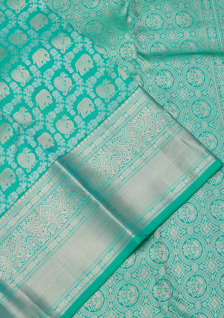 Turquoise Blue Silk Jaal Saree With Matching Blouse Piece