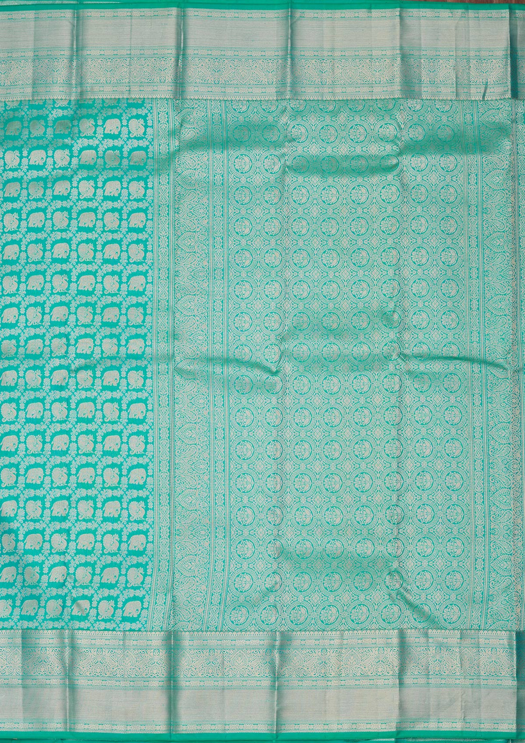 Turquoise Blue Silk Jaal Saree With Matching Blouse Piece