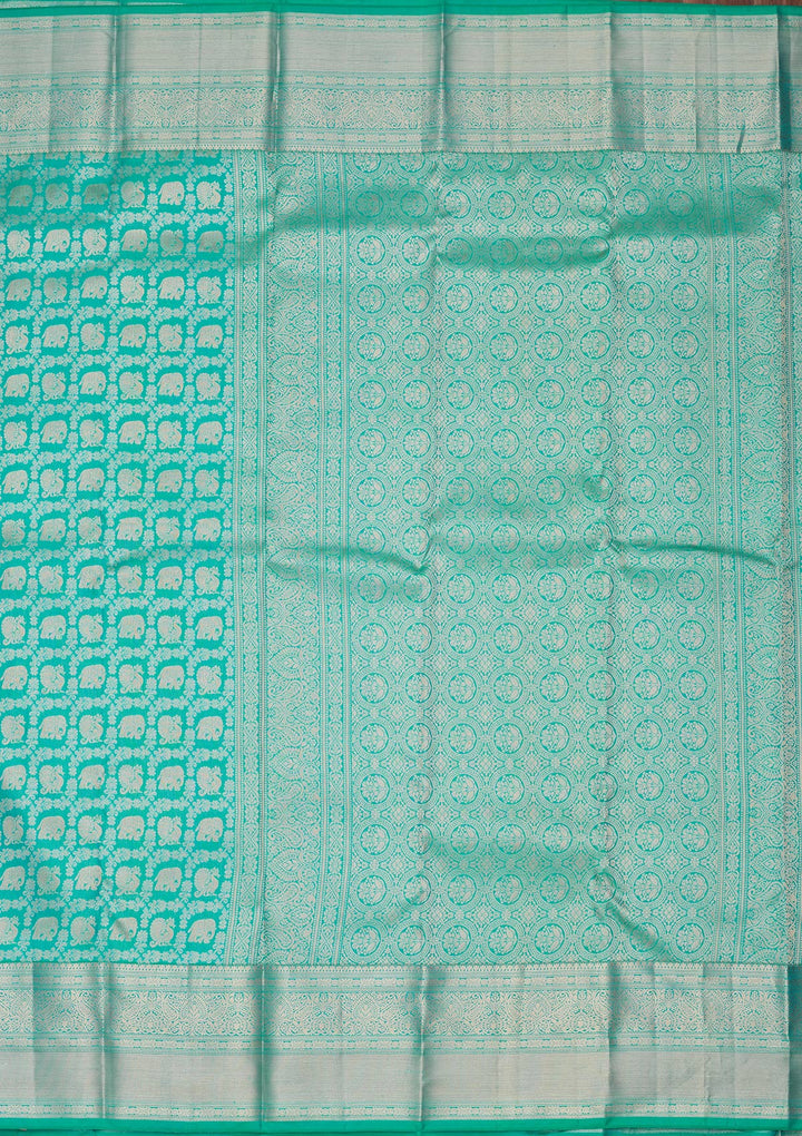 Turquoise Blue Silk Jaal Saree With Matching Blouse Piece