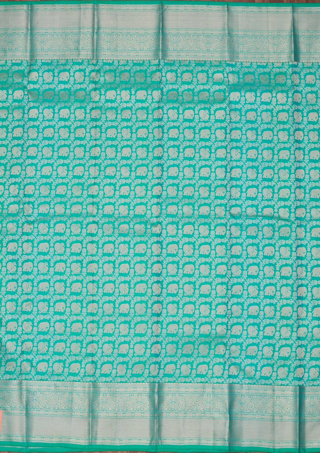 Turquoise Blue Silk Jaal Saree With Matching Blouse Piece
