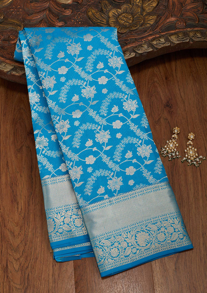 Turquoise Blue Silk Jaal Saree With Matching Blouse Piece