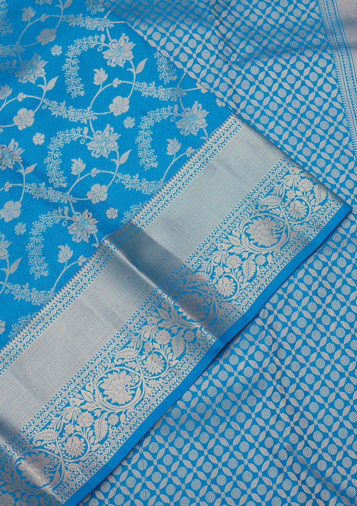 Turquoise Blue Silk Jaal Saree With Matching Blouse Piece
