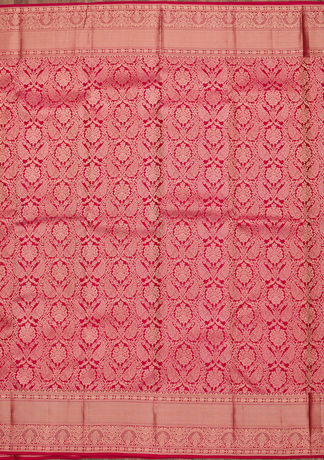 Rani Pink Silk Jaal Saree With Matching Blouse Piece