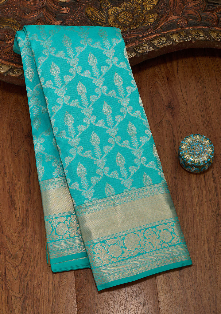 Turquoise Blue Silk Jaal Saree With Matching Blouse Piece