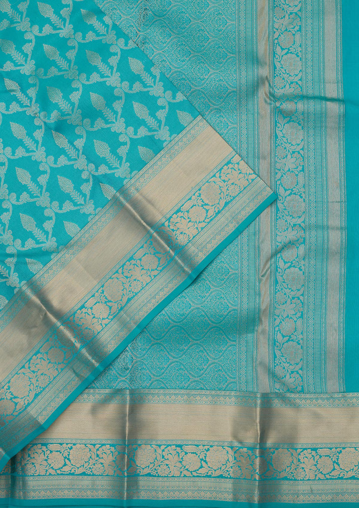 Turquoise Blue Silk Jaal Saree With Matching Blouse Piece