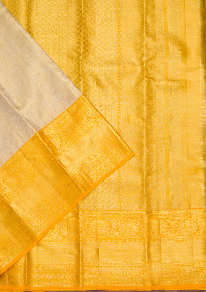 Gold Tissue Jaal Saree With Matching Blouse Piece