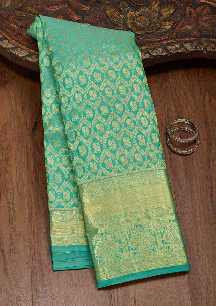 Rama Green Silk Jaal Saree With Matching Blouse Piece