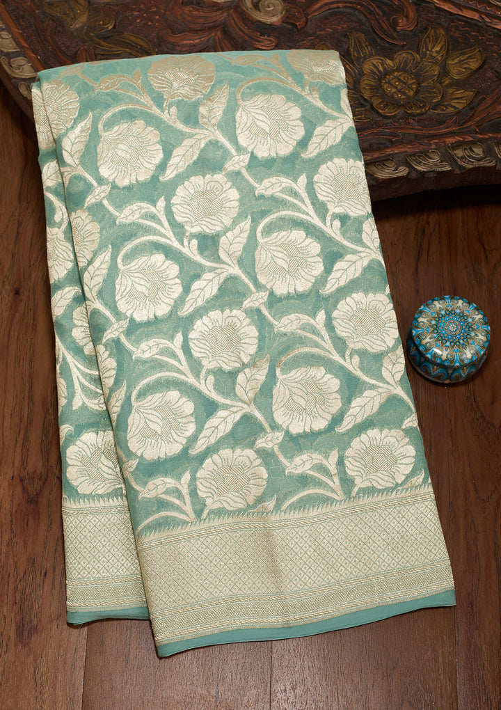 Sky Blue Georgette Jaal Gold Zariwork Saree With Matching Blouse Piece