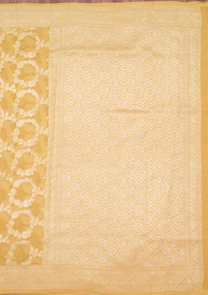 Gold Georgette Jaal Silver Zariwork Saree With Matching Blouse Piece