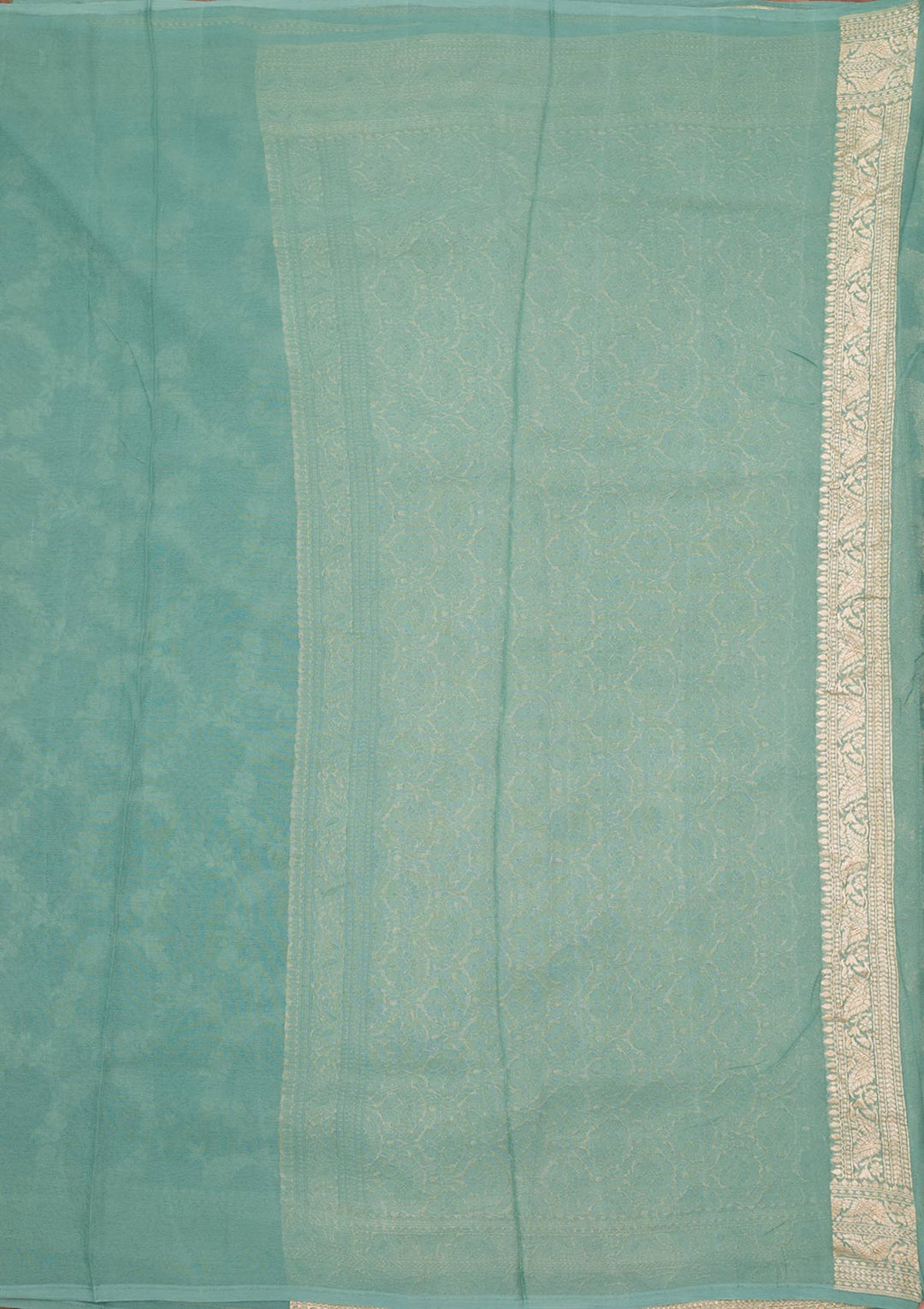 Sea Green Georgette Jaal Silver Zariwork Saree With Matching Blouse Piece