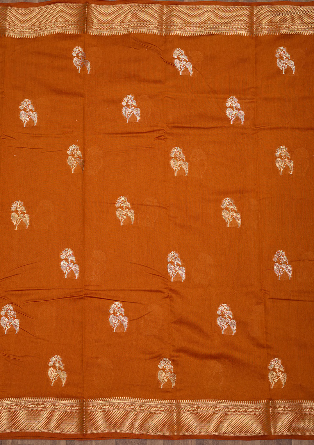 Rust Silk Buti Zariwork Saree With Matching Blouse Piece