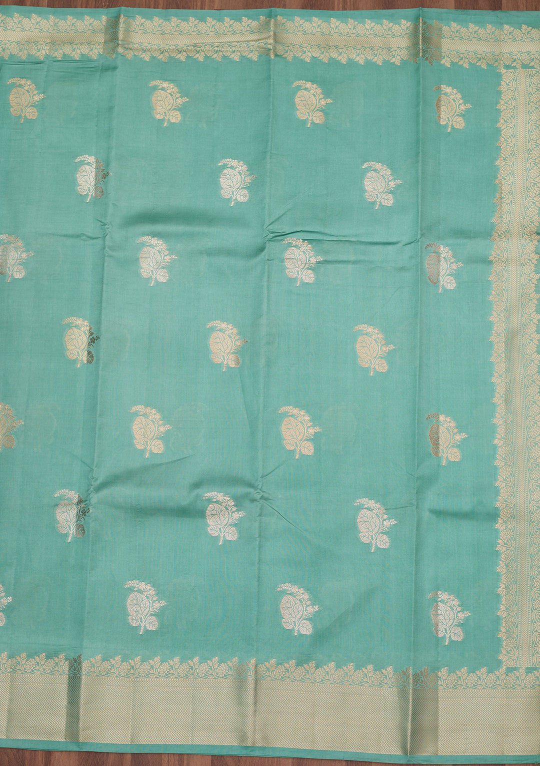 Sky Blue Silk Buti Gold Zariwork Saree With Matching Blouse Piece