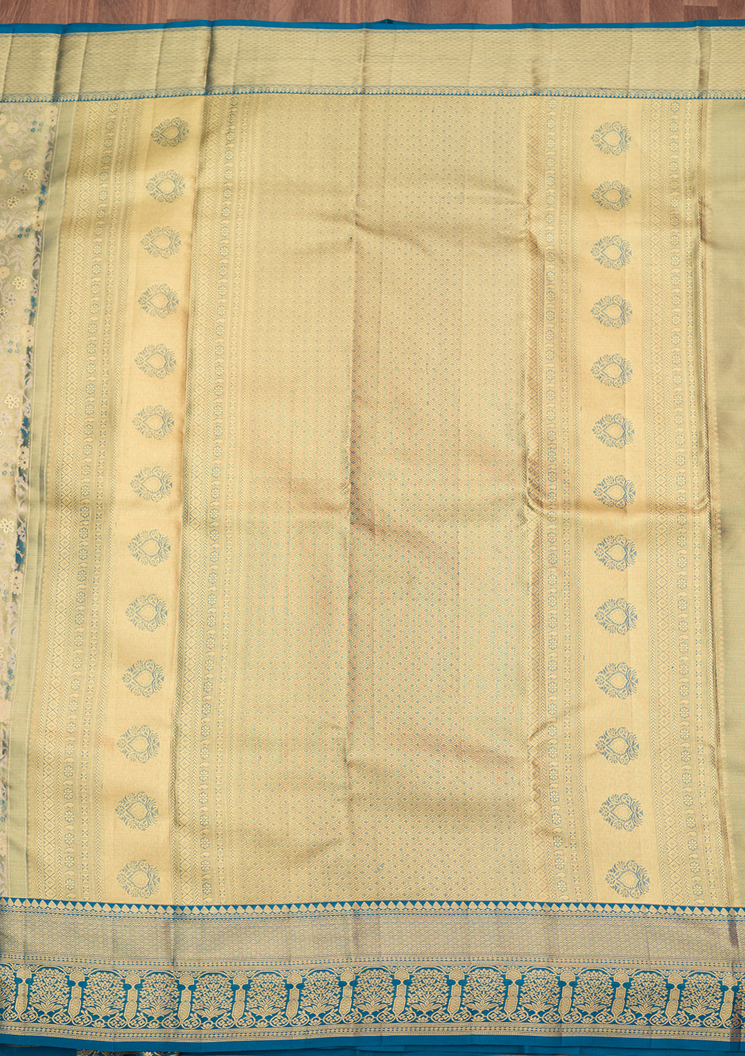 Peacock Blue Silk Jaal Gold Zariwork Saree With Matching Blouse Piece