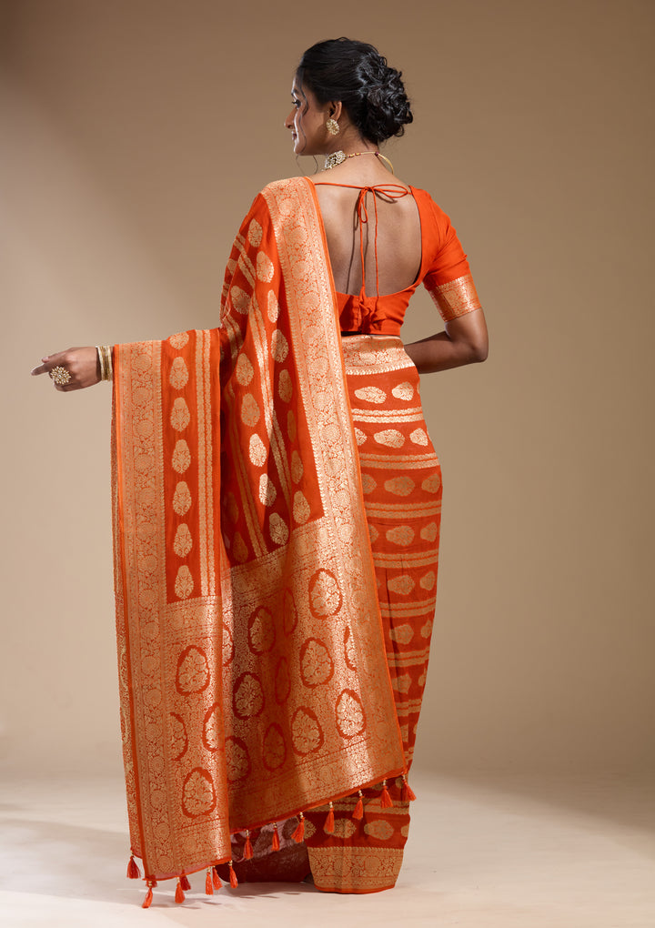 Orange Georgette Buti Stonework Saree With Matching Blouse Piece