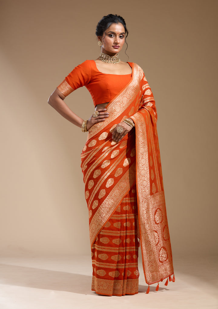 Orange Georgette Buti Stonework Saree With Matching Blouse Piece