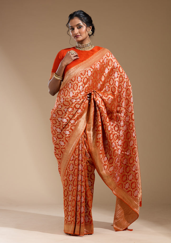 Orange Georgette Jaal Gold Zariwork Saree With Matching Blouse Piece