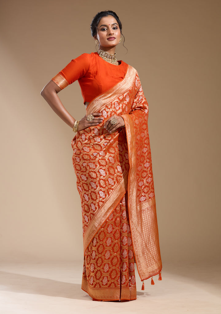 Orange Georgette Jaal Gold Zariwork Saree With Matching Blouse Piece