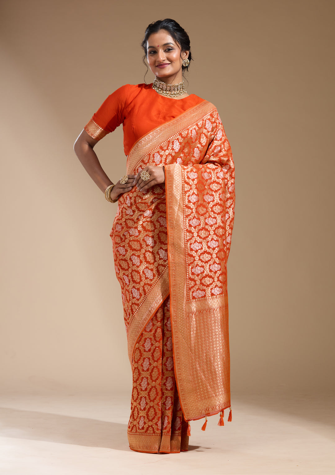 Orange Georgette Jaal Gold Zariwork Saree With Matching Blouse Piece