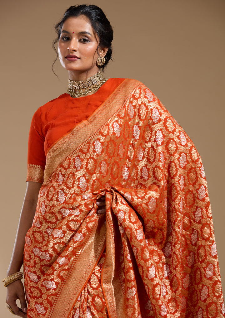 Orange Georgette Jaal Gold Zariwork Saree With Matching Blouse Piece