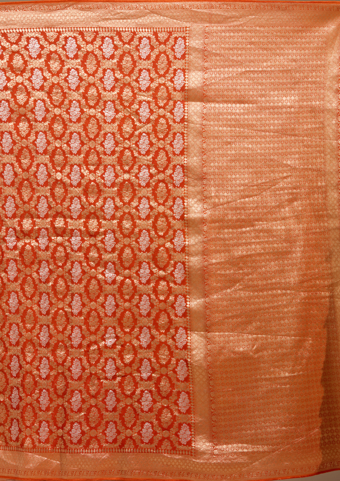 Orange Georgette Jaal Gold Zariwork Saree With Matching Blouse Piece