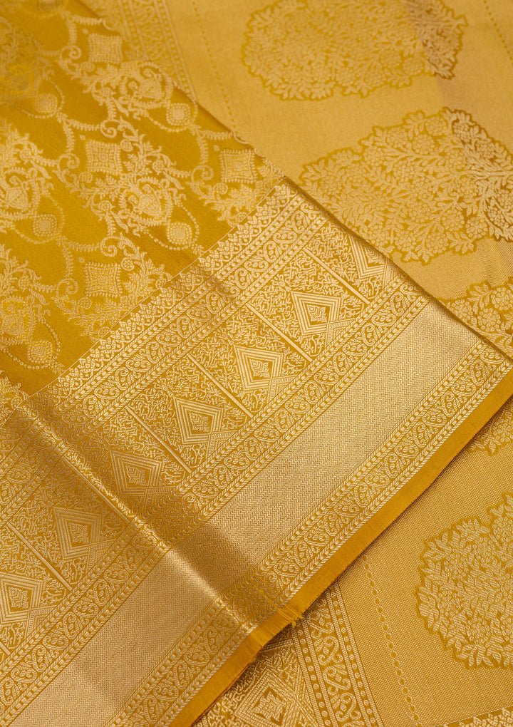 Mustard Yellow Silk Jaal Saree With Matching Blouse Piece