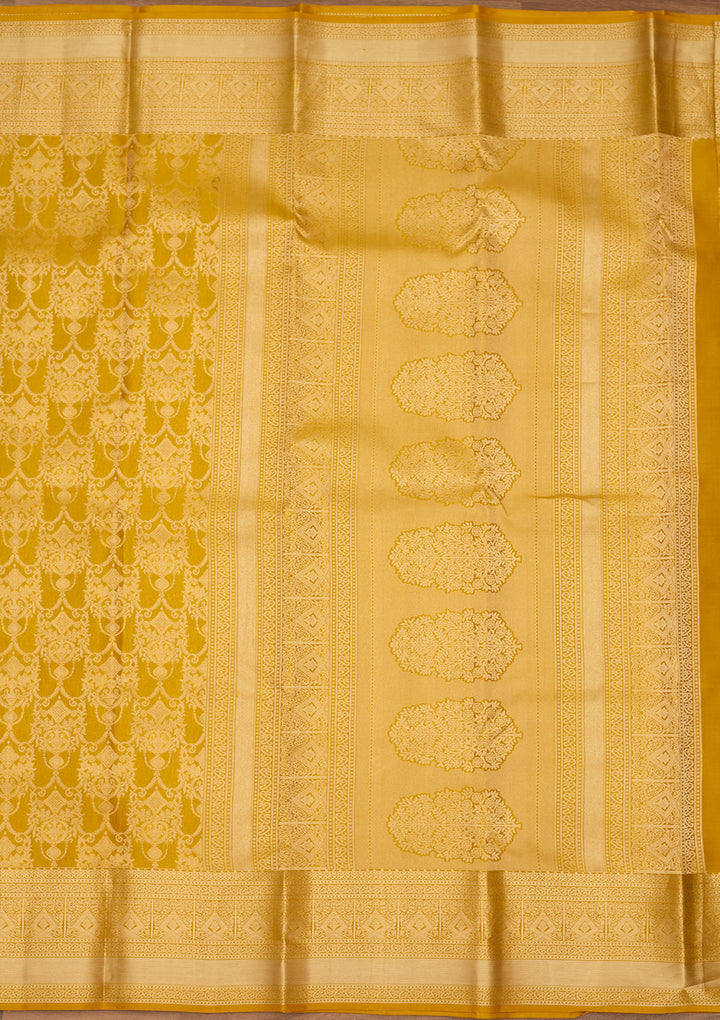 Mustard Yellow Silk Jaal Saree With Matching Blouse Piece