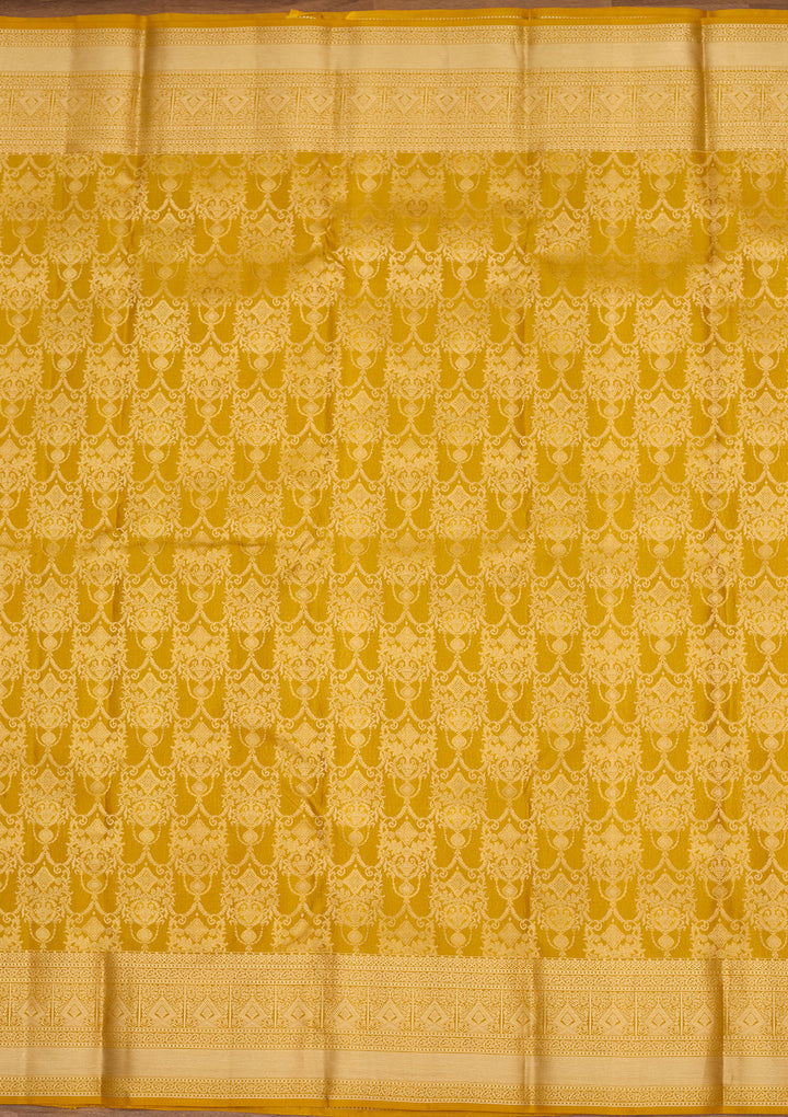 Mustard Yellow Silk Jaal Saree With Matching Blouse Piece