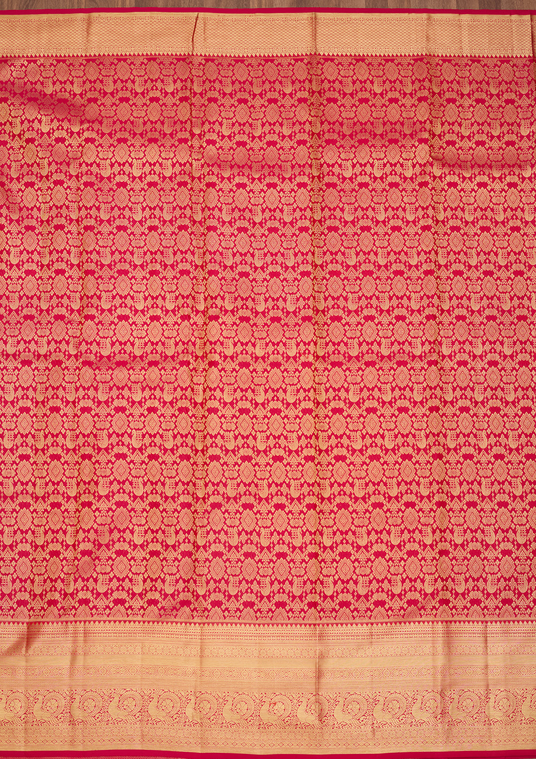 Rani Pink Silk Jaal Saree With Matching Blouse Piece