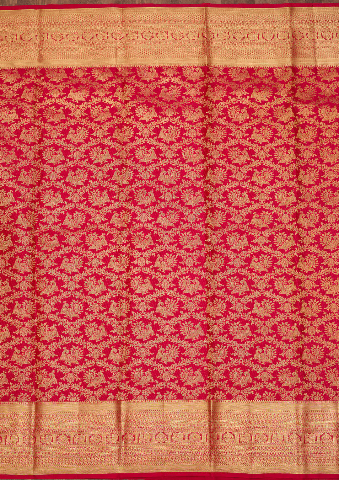 Rani Pink Silk Jaal Saree With Matching Blouse Piece
