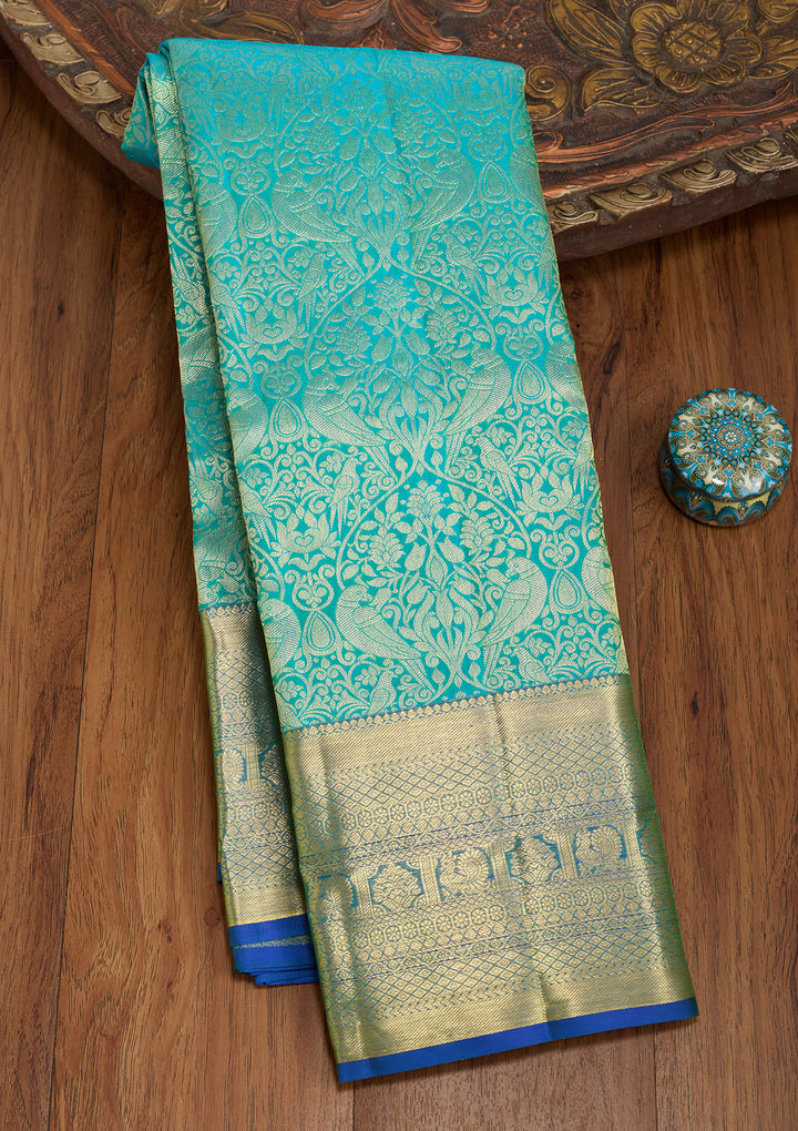 Turquoise Blue Silk Jaal Saree With Matching Blouse Piece