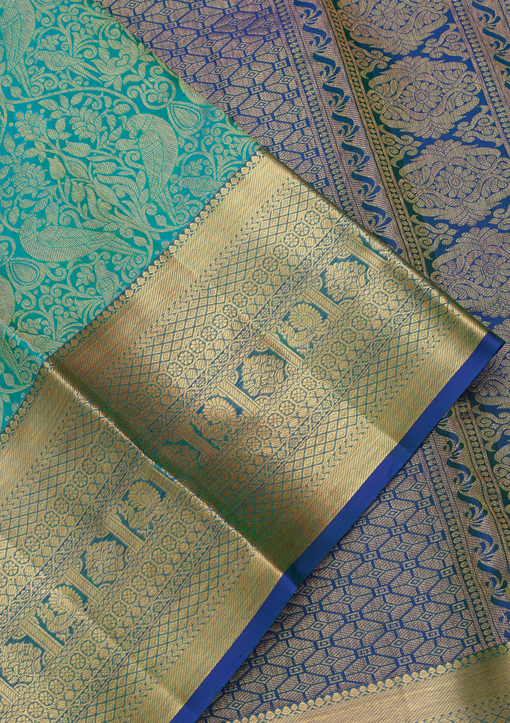 Turquoise Blue Silk Jaal Saree With Matching Blouse Piece