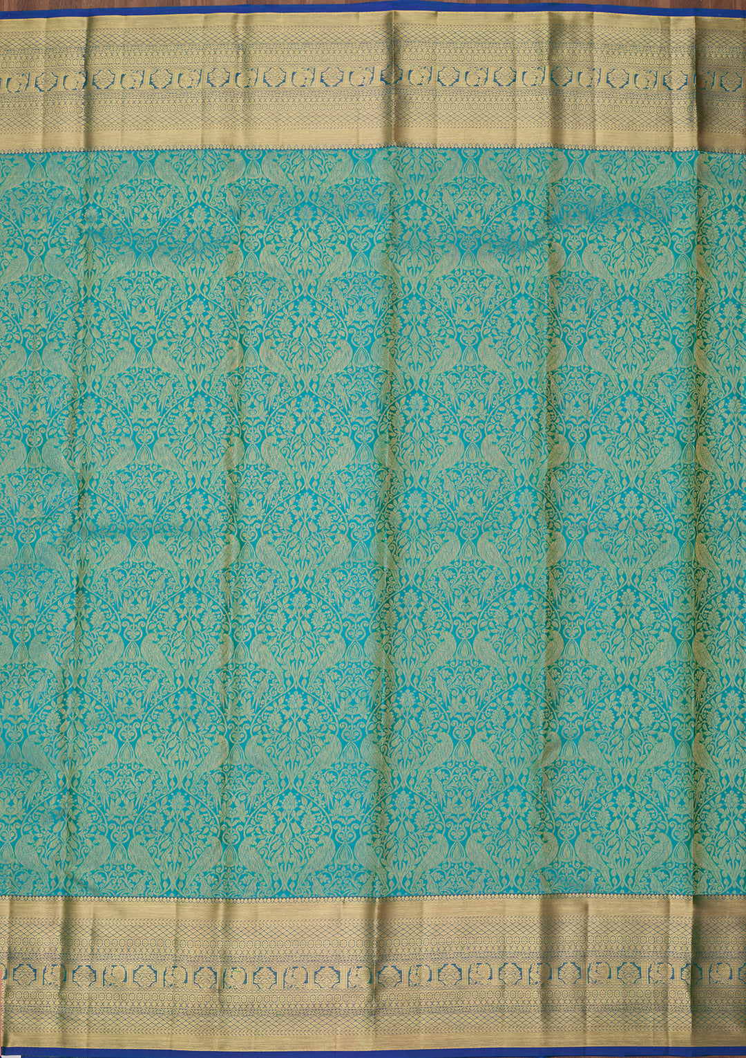 Turquoise Blue Silk Jaal Saree With Matching Blouse Piece