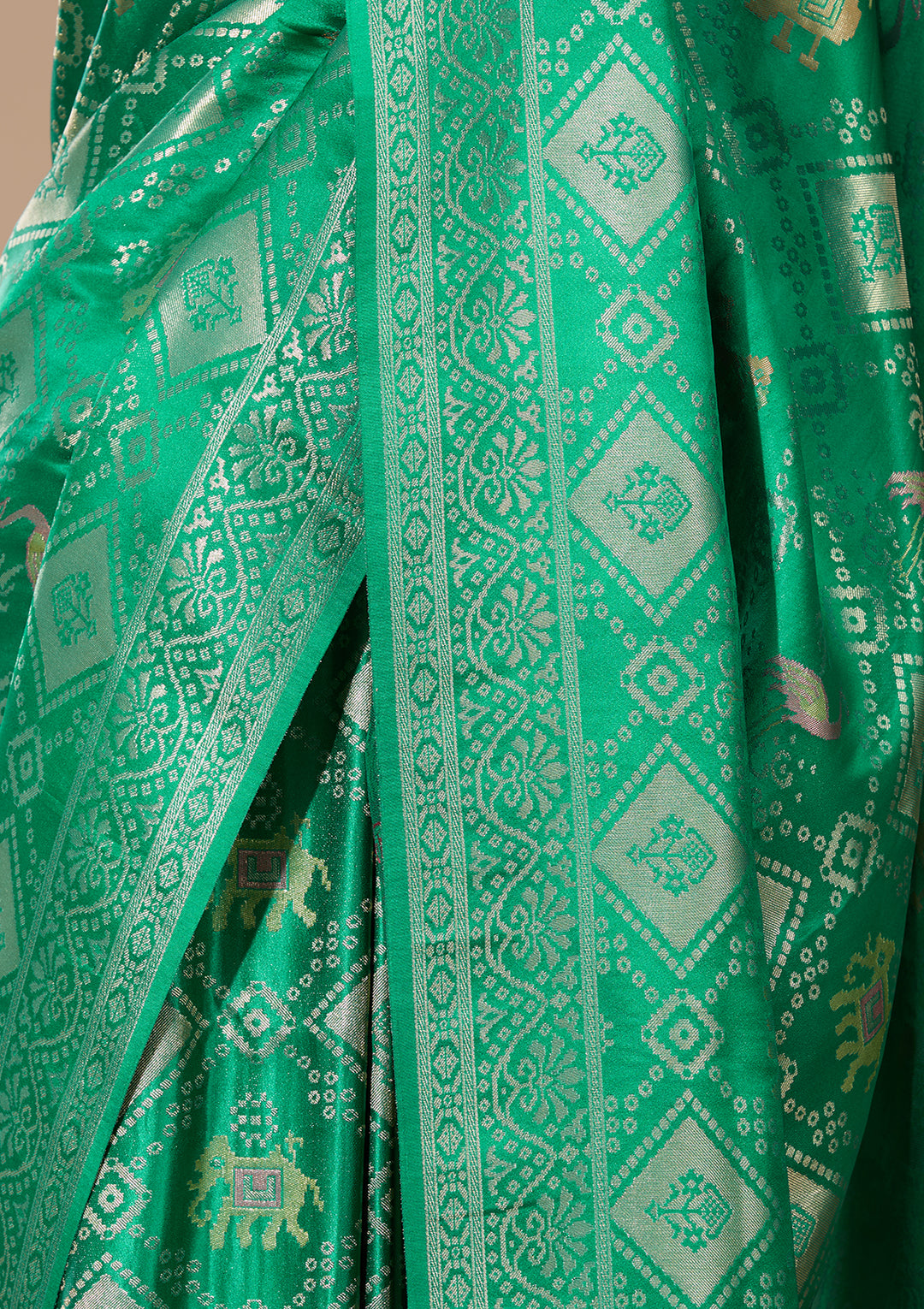 Rama Green Patola Art Silk Saree With Matching Blouse Piece