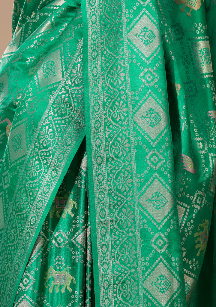 Rama Green Patola Art Silk Saree With Matching Blouse Piece