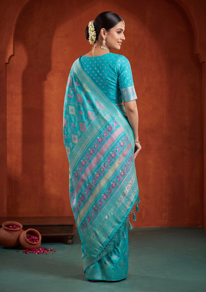 Turquoise Blue Patola Art Silk Saree With Matching Blouse Piece