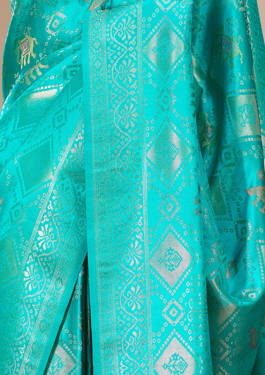 Turquoise Blue Patola Art Silk Saree With Matching Blouse Piece