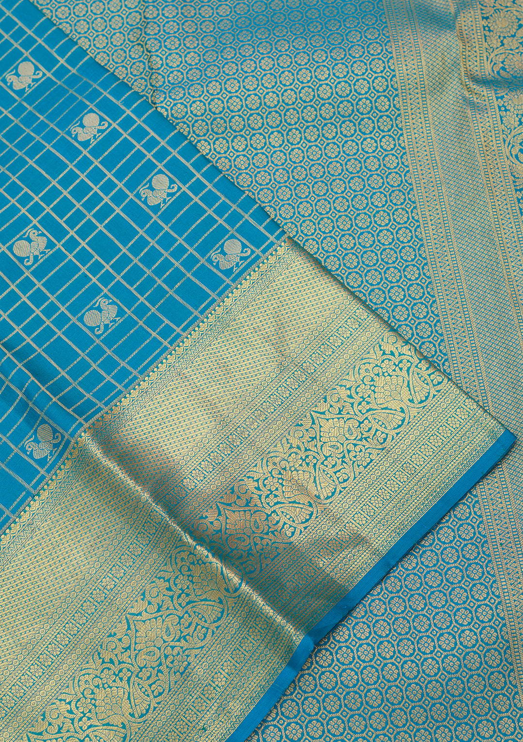 Turquoise Blue Silk Checks Saree With Matching Blouse Piece