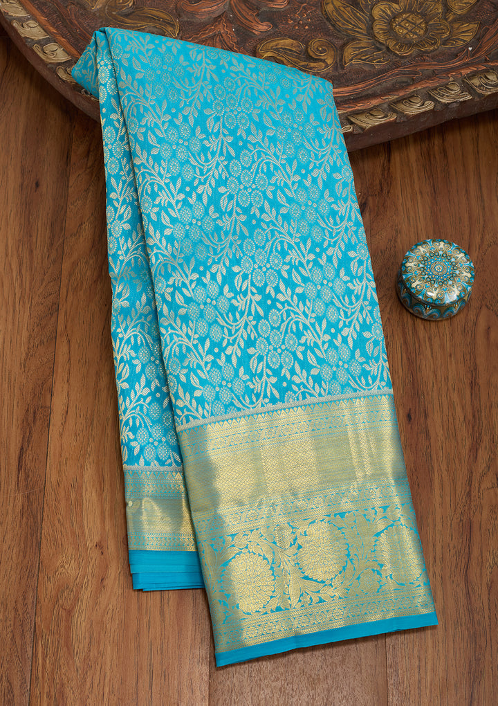 Turquoise Blue Silk Jaal Saree With Matching Blouse Piece