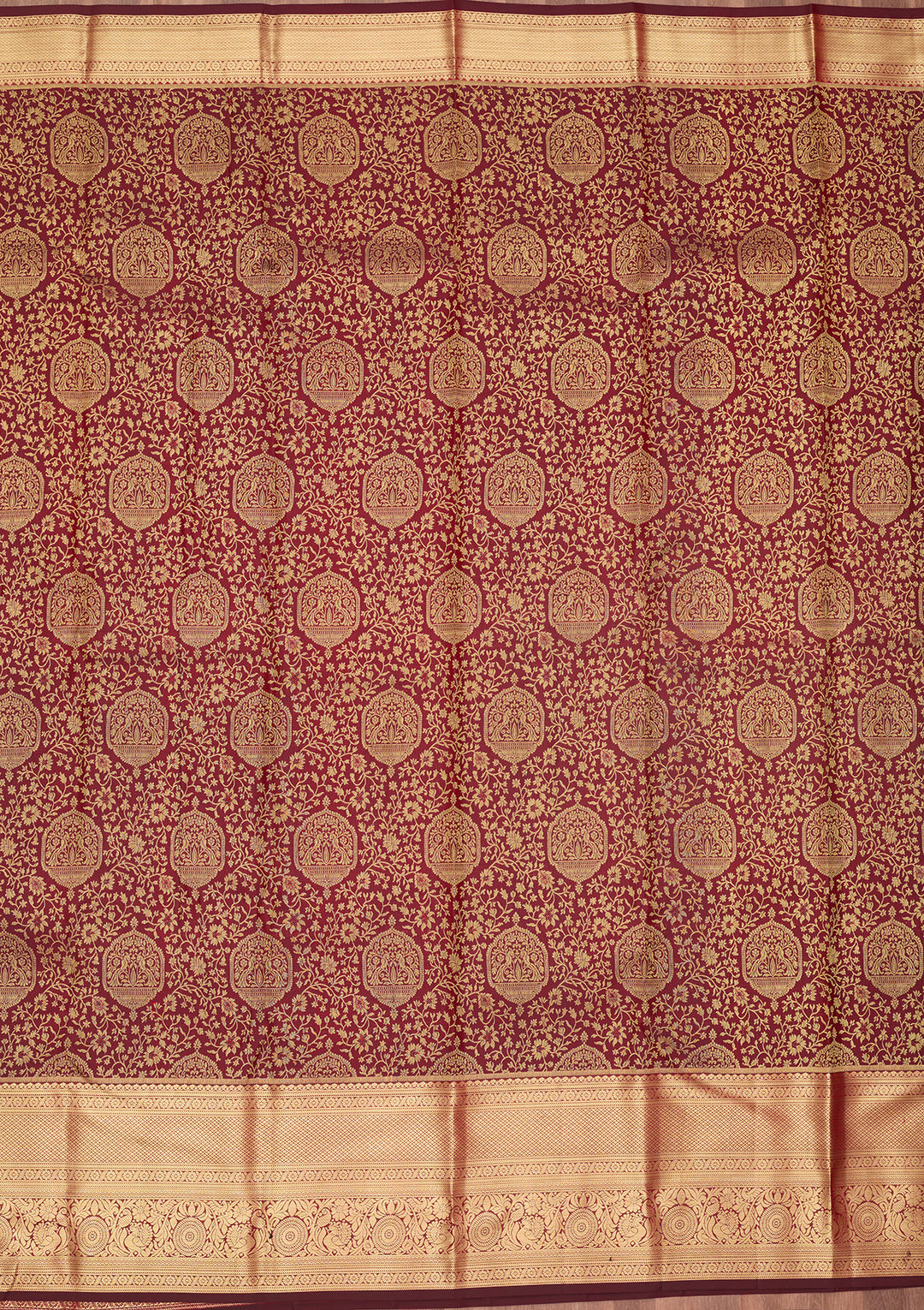 Maroon Silk Jaal Saree With Matching Blouse Piece