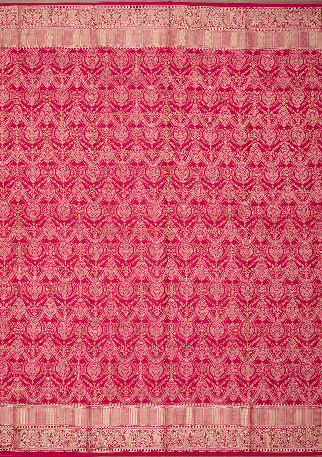 Rani Pink Silk Jaal Saree With Matching Blouse Piece
