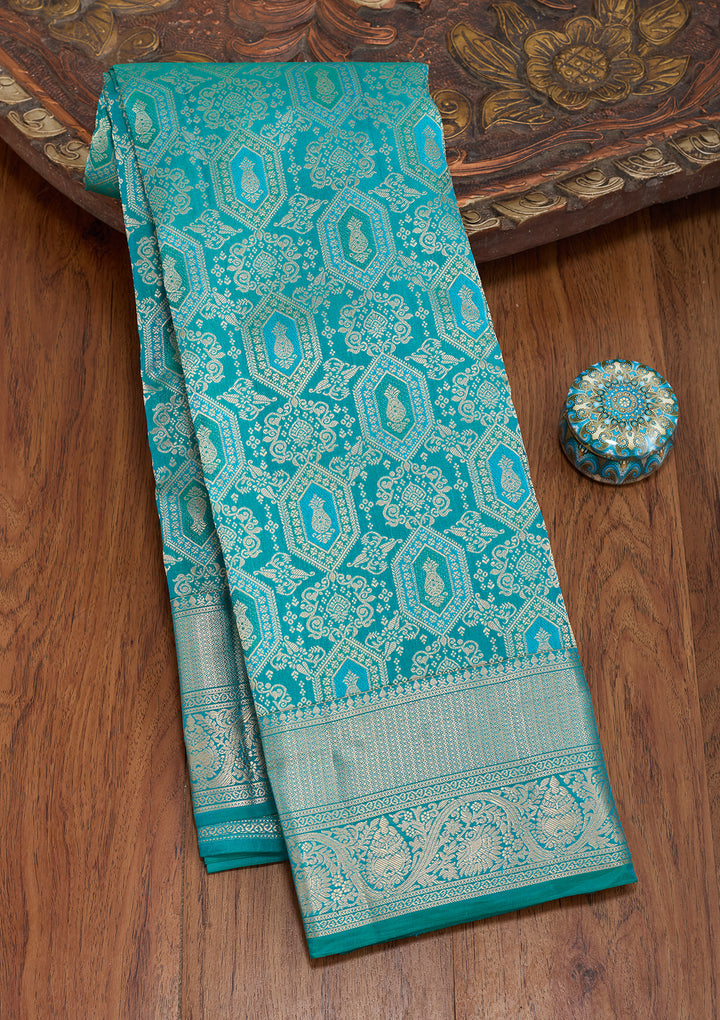 Peacock Green Silk Jaal Saree With Matching Blouse Piece