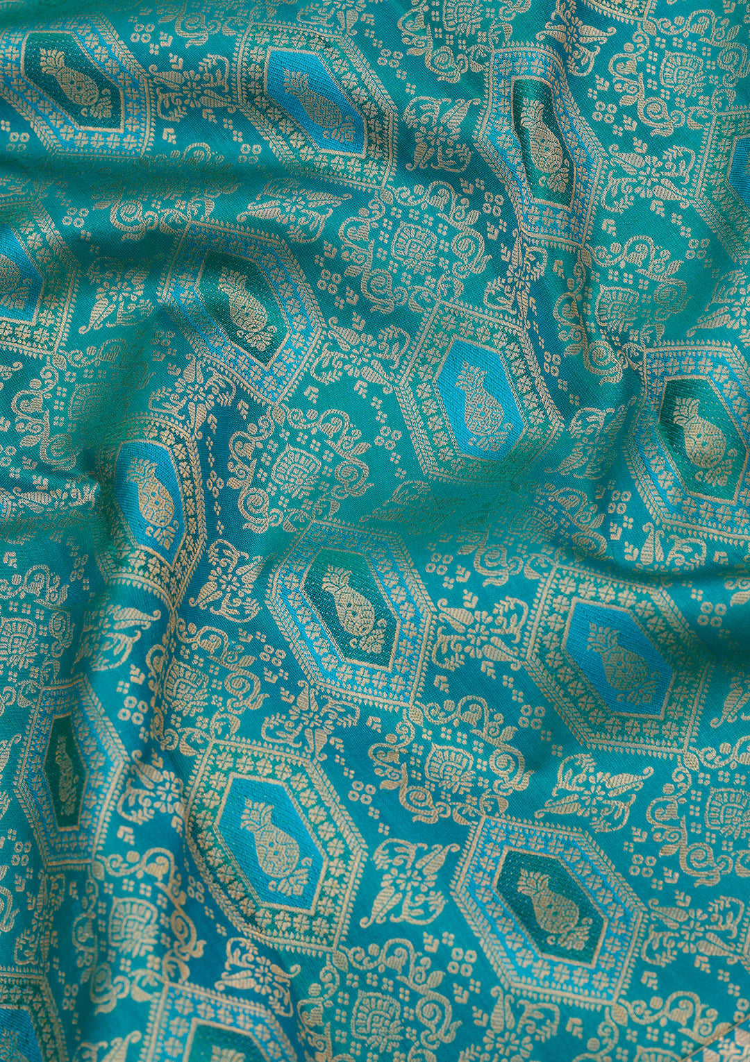 Peacock Green Silk Jaal Saree With Matching Blouse Piece