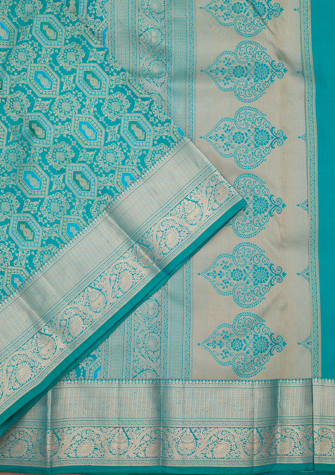 Peacock Green Silk Jaal Saree With Matching Blouse Piece