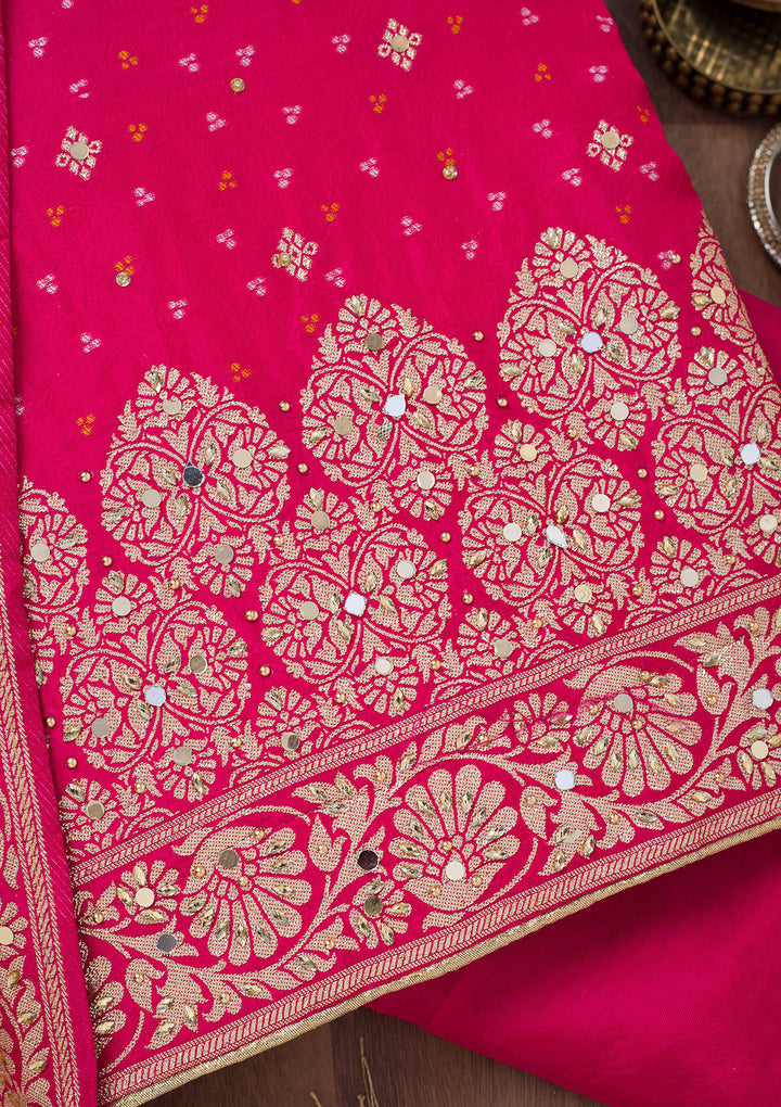 Rani Pink Mirrorwork Semi Crepe Unstitched Salwar Suit