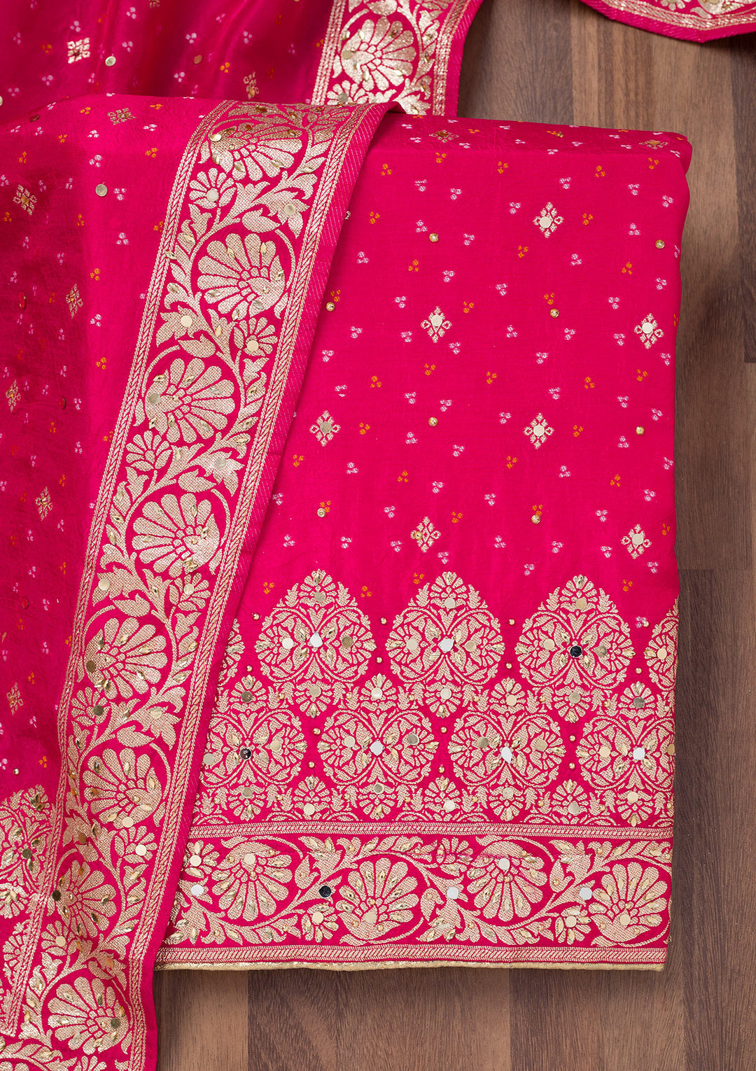 Rani Pink Mirrorwork Semi Crepe Unstitched Salwar Suit