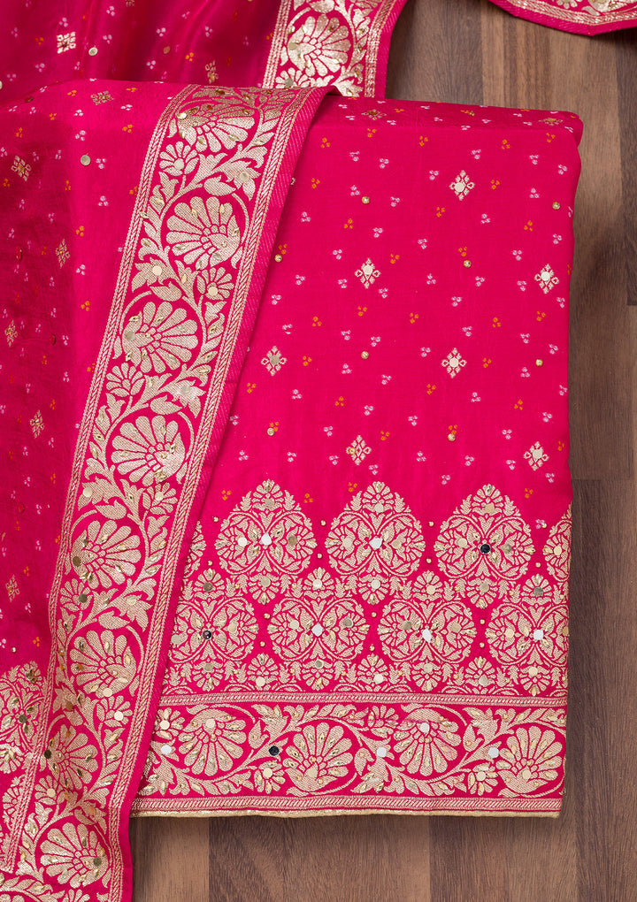 Rani Pink Mirrorwork Semi Crepe Unstitched Salwar Suit